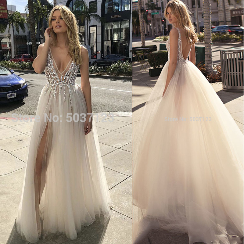 Summer Wedding Dresses 2020 Deep V Neckline Beaded High Split Backless A Line Tulle Sleeveless Boho Bridal Gowns Vestido Noiva, Same as image
Summer Wedding Dresses 2020 Deep V Neckline Beaded High Split Backless A Line Tulle Sleeveless Boho Bridal Gowns Vestido Noiva, Same as image