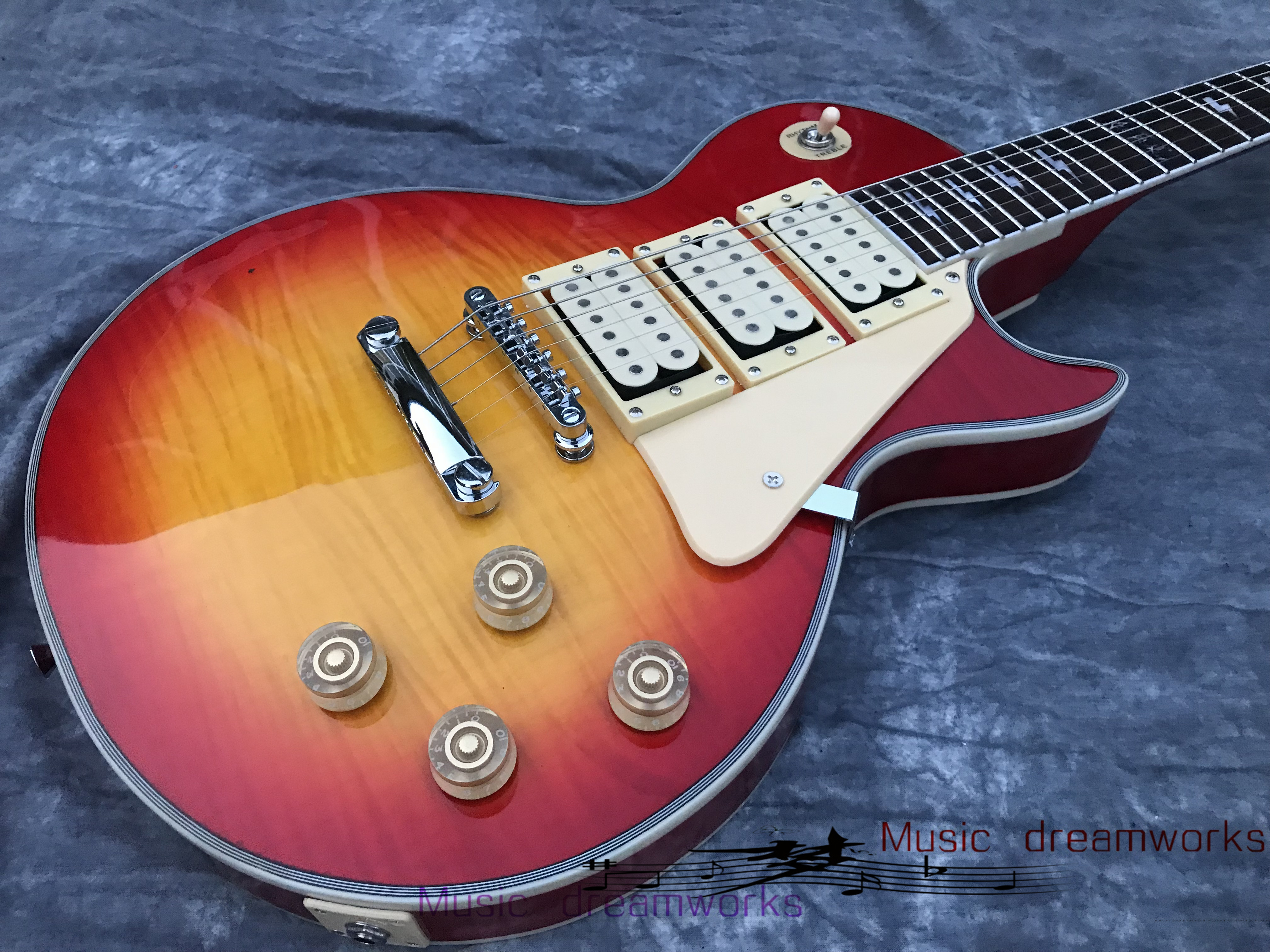 Custom shop A ce frehley signature 3 pickups Electric Guitar,High quality flamed maple wood,free shipping
Custom shop A ce frehley signature 3 pickups Electric Guitar,High quality flamed maple wood,free shipping