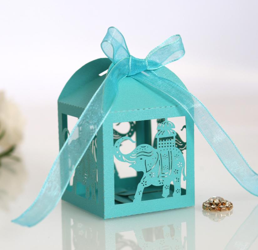 50p Laser Hollow Wedding Candy Box Wedding Southeast Asia Elephant Festival Sugar Box Reflectiv Golden Ribbon Carton Packaging 5
50p Laser Hollow Wedding Candy Box Wedding Southeast Asia Elephant Festival Sugar Box Reflectiv Golden Ribbon Carton Packaging 5