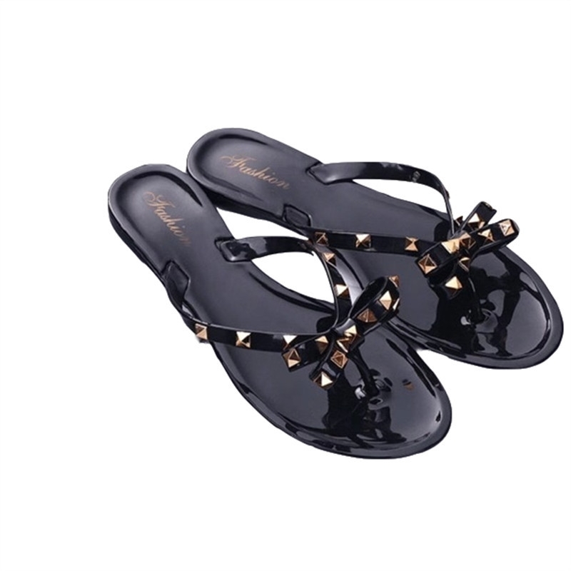 2019 new slippers female summer fashion rivet bow flip flops wear wild flat jelly shoes sandals and slippers Y200620, Beige 
2019 new slippers female summer fashion rivet bow flip flops wear wild flat jelly shoes sandals and slippers Y200620, Beige