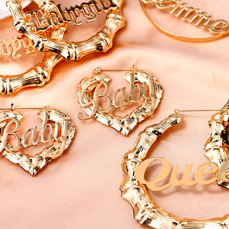 JJFOUCS Retro Alloy Baby Letter Heart Hoop Earrings Gold Silver Color Hollow Bamboo Earrings Female Hip Hop Personality Jewelry
JJFOUCS Retro Alloy Baby Letter Heart Hoop Earrings Gold Silver Color Hollow Bamboo Earrings Female Hip Hop Personality Jewelry