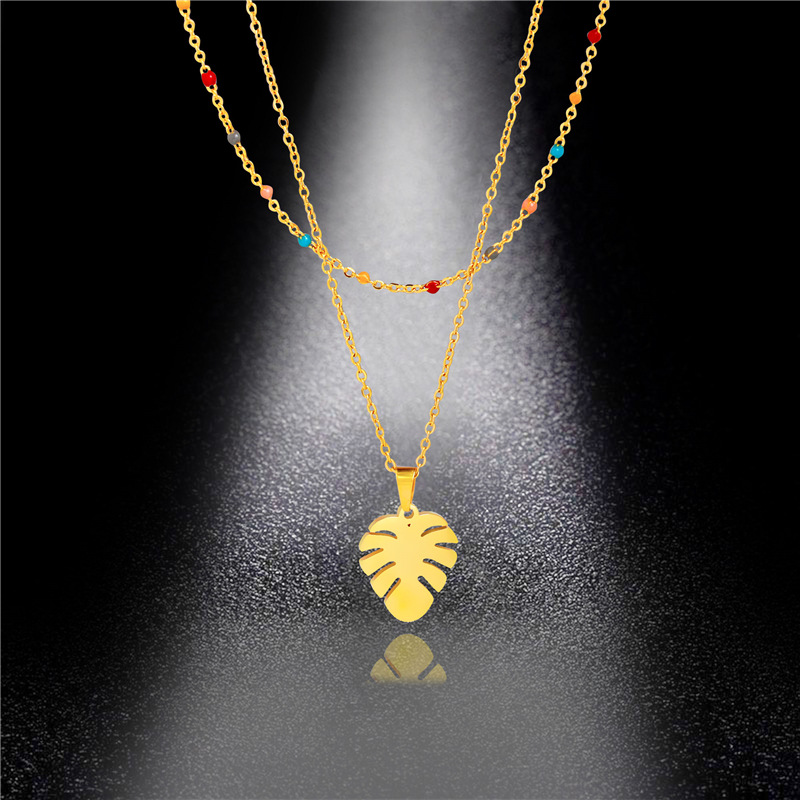 Creative Titanium Steel Double Layer Mixed Color Drip Oil Leaf Necklace Female 316L Stainless Steel Choker Necklace Pendant 
Creative Titanium Steel Double Layer Mixed Color Drip Oil Leaf Necklace Female 316L Stainless Steel Choker Necklace Pendant