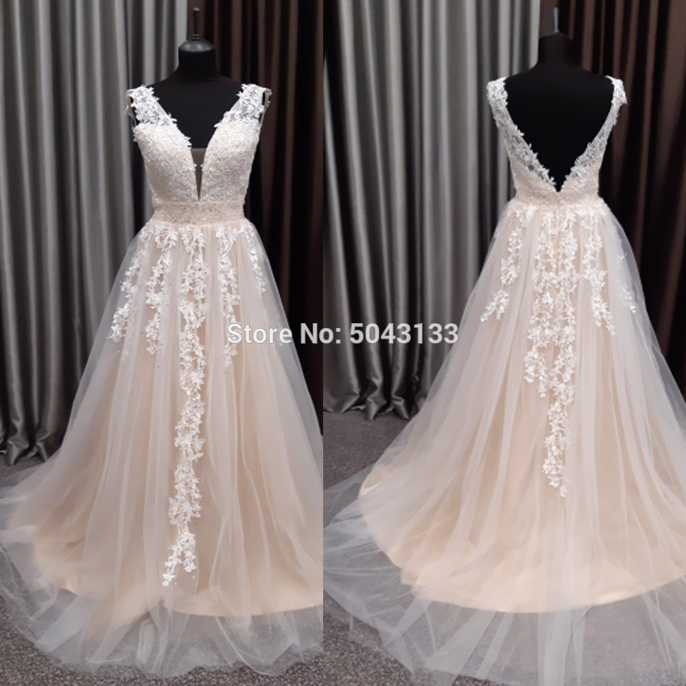 V Neck Champagne Wedding Dresses with Beaded Sash Lace Appliques A Line Sleeveless Backless Wedding Bridal Gowns 2020 Formal, Ivory
V Neck Champagne Wedding Dresses with Beaded Sash Lace Appliques A Line Sleeveless Backless Wedding Bridal Gowns 2020 Formal, Ivory