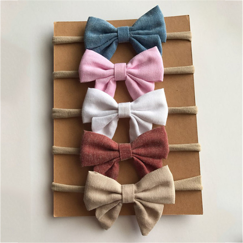 4pcs/lot 8colors Handmade Newborn kids Bow Nylon Headbands Soft Nylon Headwear Nylon Elastic Head band
4pcs/lot 8colors Handmade Newborn kids Bow Nylon Headbands Soft Nylon Headwear Nylon Elastic Head band