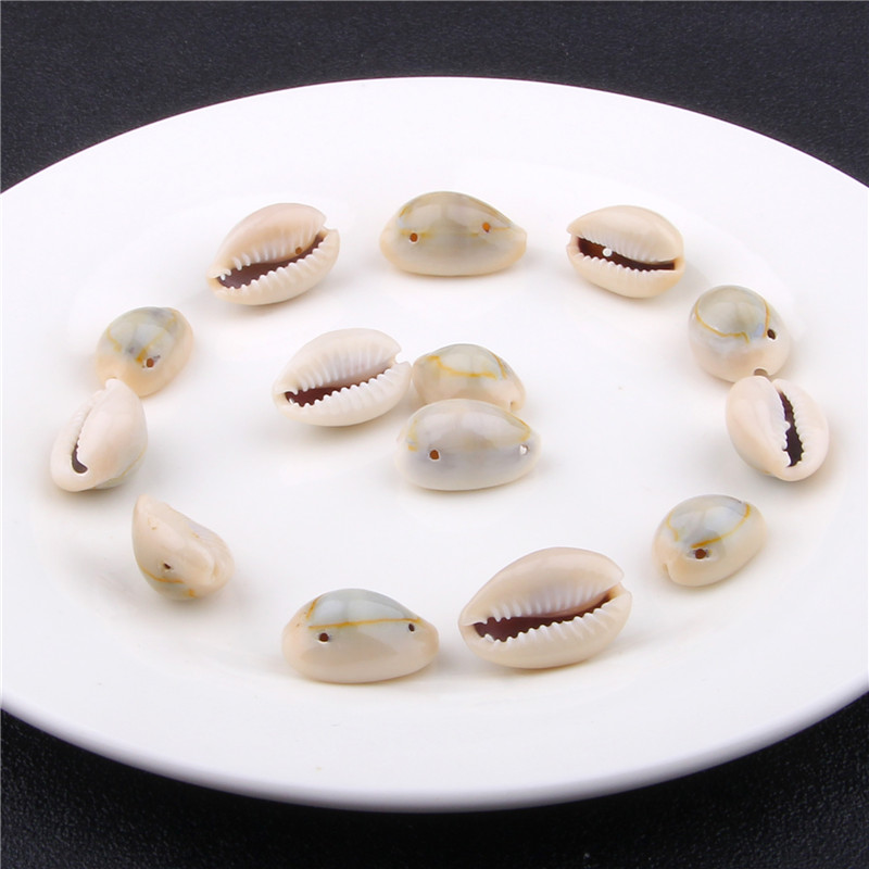 30pcs 20*13 2 holes Small Bulk Cut Beach Sea Natural Shell Conch Beads Cowry Cowrie Tribal Jewelery Craft Accessories DIY
30pcs 20*13 2 holes Small Bulk Cut Beach Sea Natural Shell Conch Beads Cowry Cowrie Tribal Jewelery Craft Accessories DIY