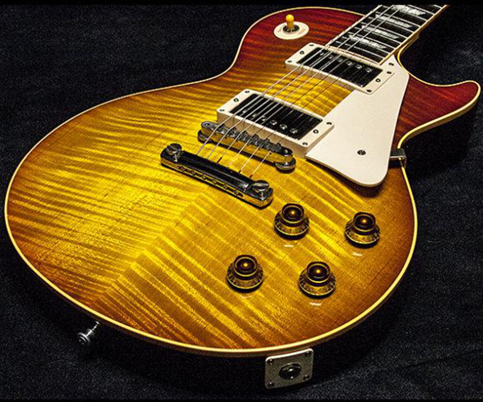 GaryMoore 1959 Tiger Flame Maple Top Tobacco Sunburst electric guitar Cream Body Binding Tuilp Tuners
GaryMoore 1959 Tiger Flame Maple Top Tobacco Sunburst electric guitar Cream Body Binding Tuilp Tuners