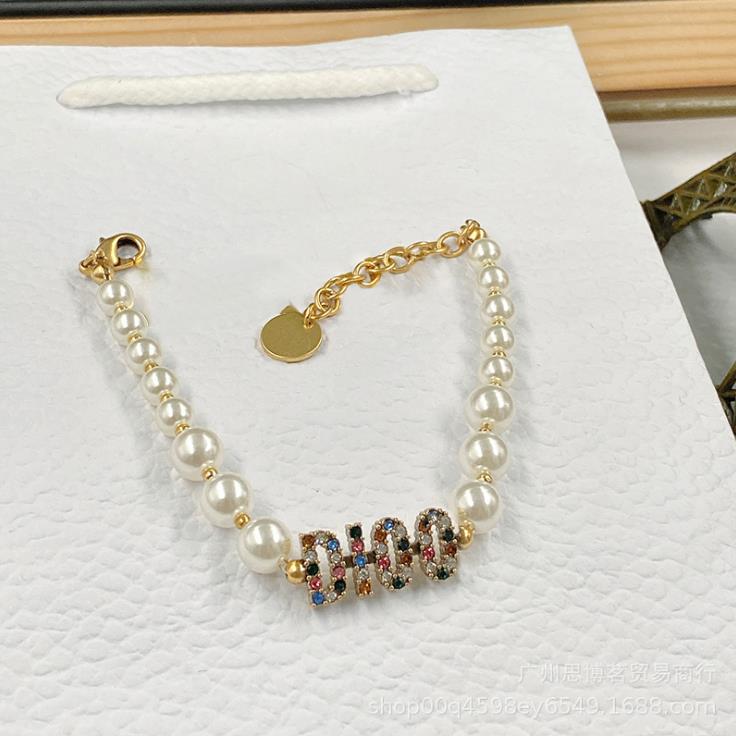 New CD letter pearl necklace bracelet women noble popular light luxury high texture Japanese and Korean fashion, Golden;silver
New CD letter pearl necklace bracelet women noble popular light luxury high texture Japanese and Korean fashion, Golden;silver