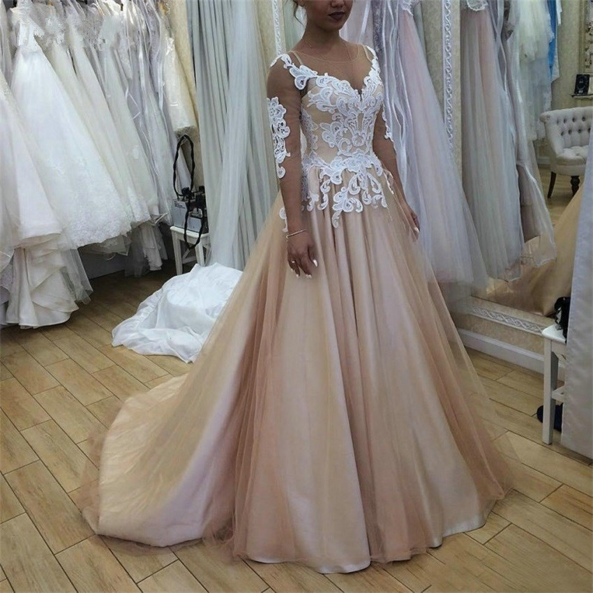 2020 New Champagne Wedding Dresses Sweep Train Sheer Scoop Neck Long Sleeve Lace Appliques Backless Bridal Gowns robe de mariee, Ivory
2020 New Champagne Wedding Dresses Sweep Train Sheer Scoop Neck Long Sleeve Lace Appliques Backless Bridal Gowns robe de mariee, Ivory