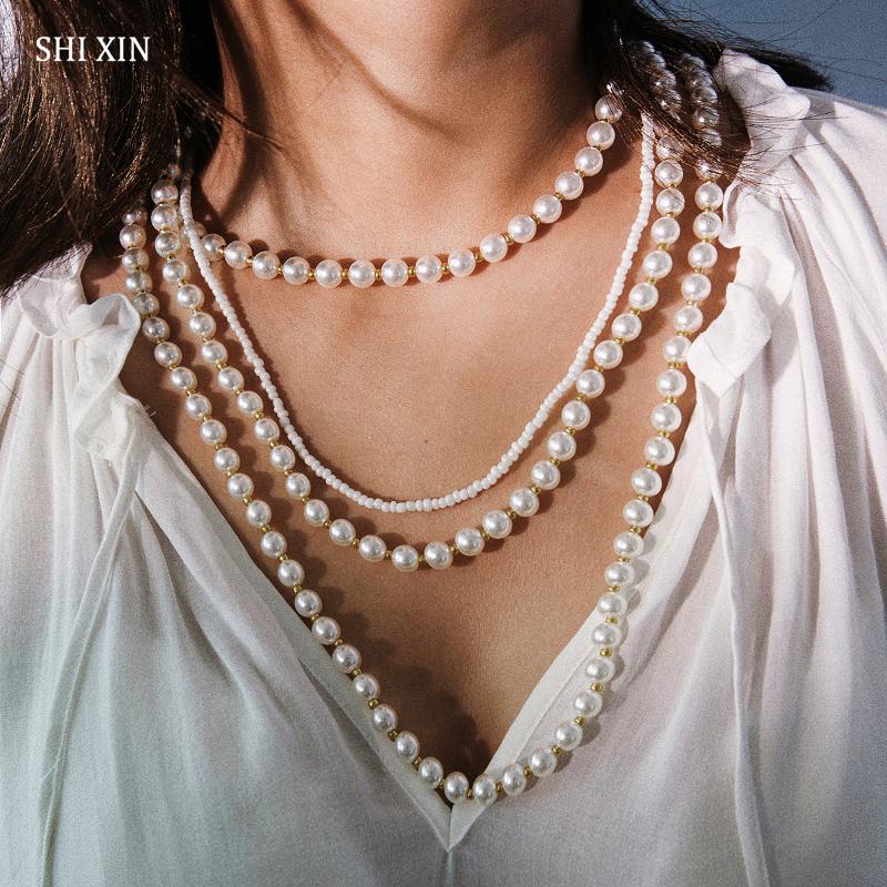 SHIXIN Hip Hop Pearl Choker Necklace for Women Exaggerated Big Layered Bead Necklace Personalized Jewelry Decoration on the Neck
SHIXIN Hip Hop Pearl Choker Necklace for Women Exaggerated Big Layered Bead Necklace Personalized Jewelry Decoration on the Neck