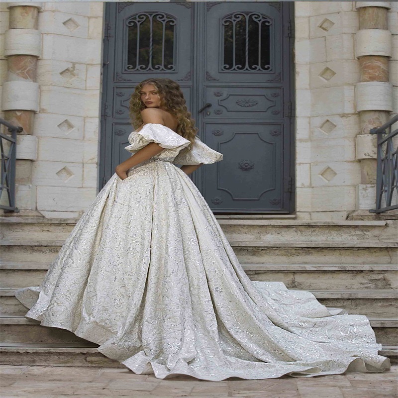 Luxury Wedding Dresses Sexy Sweetheart Bridal Gowns Bling Sequins Beads Appliqued Sweep Train Beach Custom Made Vestido De Novia
