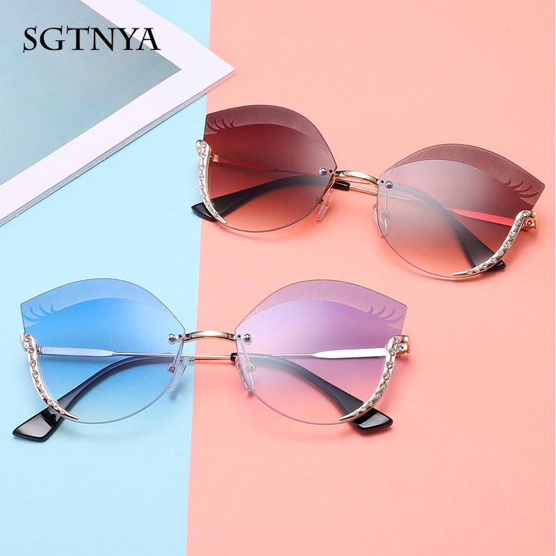 SGTNYA New high-end hot cat eye sunglasses Europe and the United States fashion ladies sunglasses frameless metal glasses UV400
SGTNYA New high-end hot cat eye sunglasses Europe and the United States fashion ladies sunglasses frameless metal glasses UV400
