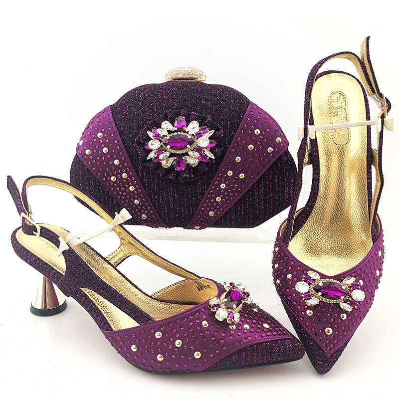 Latest wedding/party sets purple pointed toe shoes and handbag set with shinning stones MM1107 heel height 7cm, As pic
Latest wedding/party sets purple pointed toe shoes and handbag set with shinning stones MM1107 heel height 7cm, As pic