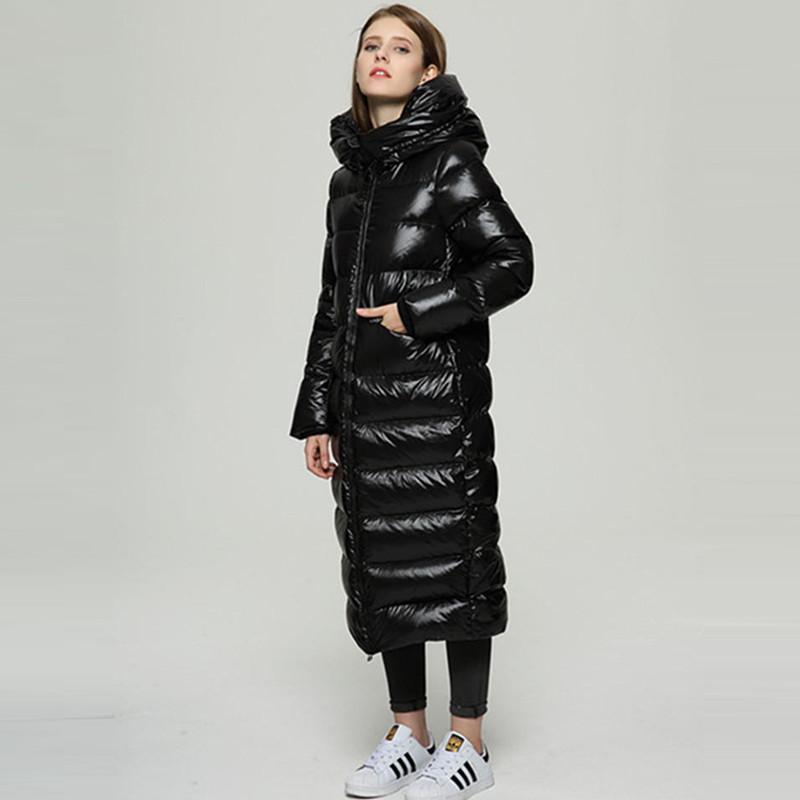 the new type cocoon long over-the-knee down jacket female black bright face with thick loose white duck down warm coat
the new type cocoon long over-the-knee down jacket female black bright face with thick loose white duck down warm coat