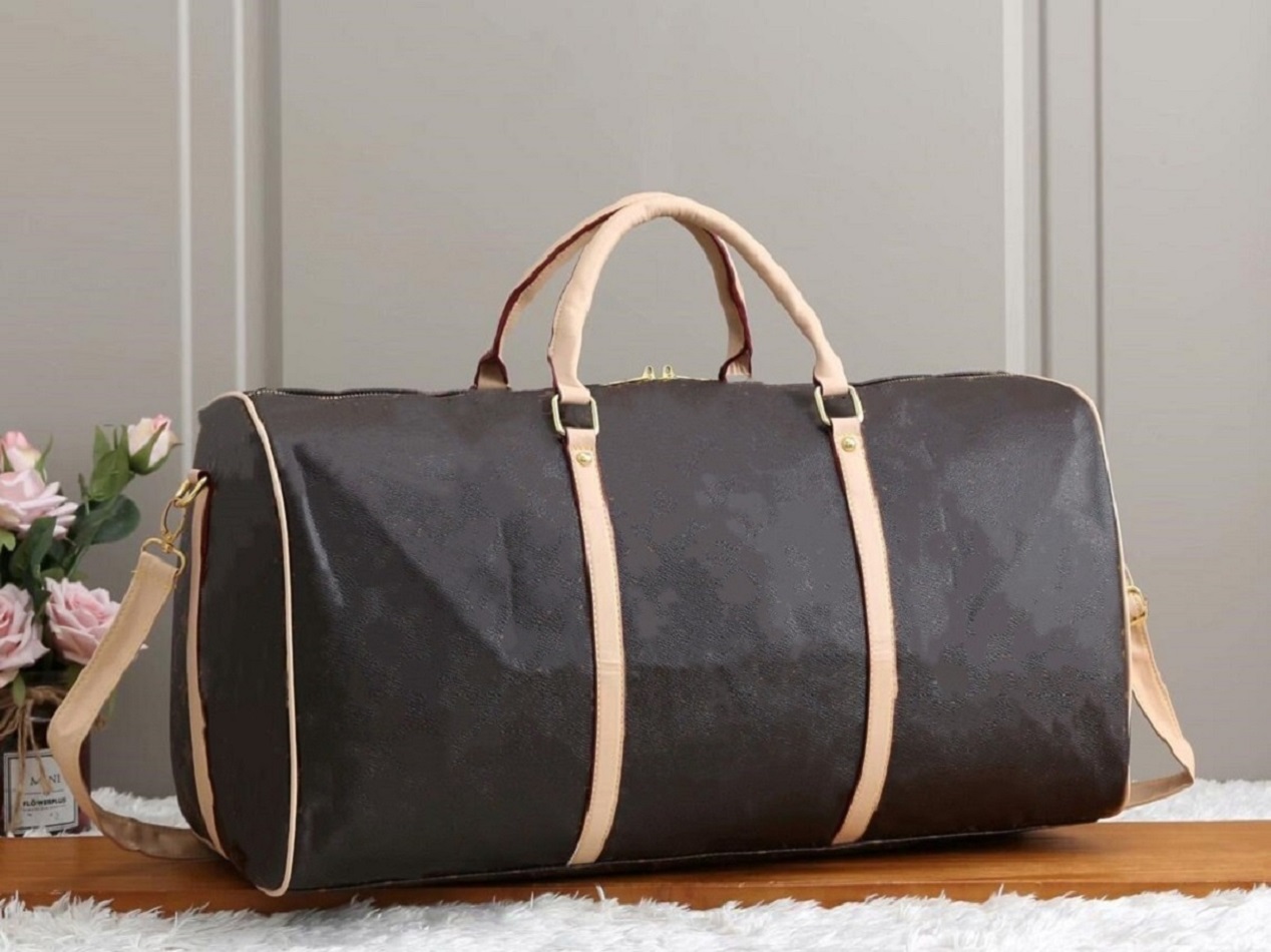 55CM PU large capacity women travel bags sale quality men shoulder duffel bags carry on luggage bottom rivets with lock hea
55CM PU large capacity women travel bags sale quality men shoulder duffel bags carry on luggage bottom rivets with lock hea