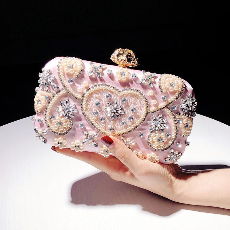 2020 new clutch bag female lady temperament evening bag evening dress wild party pearl small handbag
2020 new clutch bag female lady temperament evening bag evening dress wild party pearl small handbag