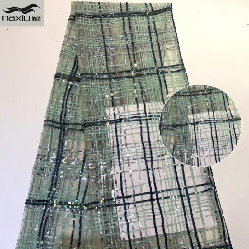 Madison French Nigerian Lace Fabrics African Mesh Sequence Lace Fabric 2020 High Quality Material For Wedding Dress1
Madison French Nigerian Lace Fabrics African Mesh Sequence Lace Fabric 2020 High Quality Material For Wedding Dress1