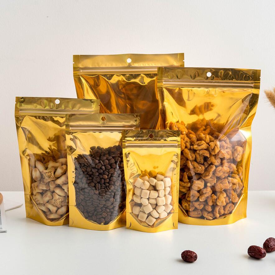 Portable Gold Zipper Aluminized Packing Bags Resealable Clear Dried food Storage bags Candy Smell Proof Storage Zipper Bag with Hang Hole
Portable Gold Zipper Aluminized Packing Bags Resealable Clear Dried food Storage bags Candy Smell Proof Storage Zipper Bag with Hang Hole