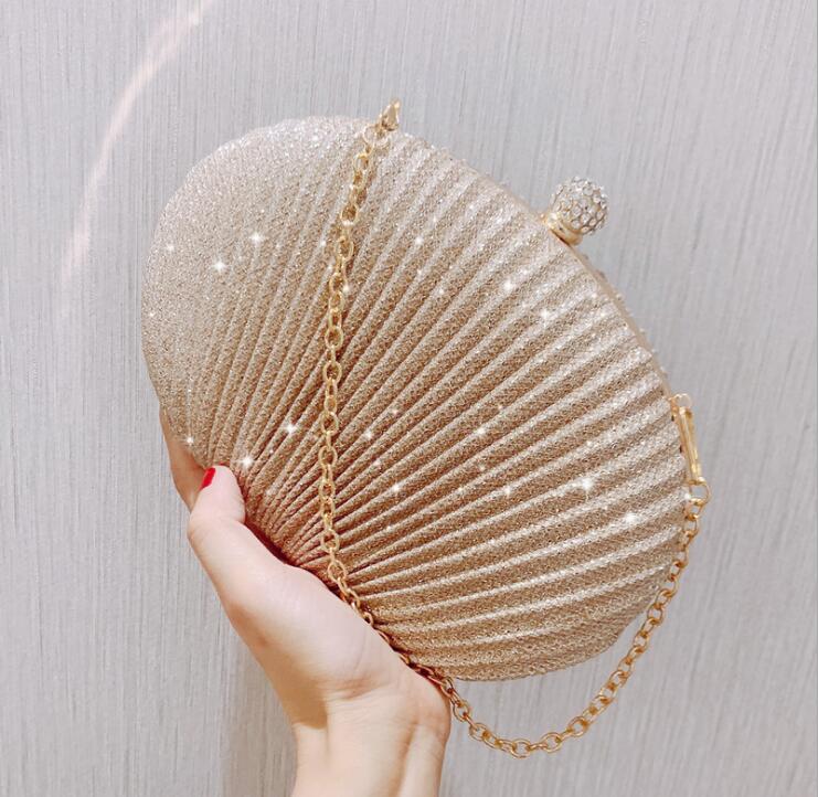 2021 new female bag European and American dinner bag creative shell clutch single shoulder cosmetic bag, White
2021 new female bag European and American dinner bag creative shell clutch single shoulder cosmetic bag, White