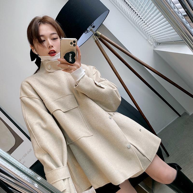 2020 winter solid color loose woolen overcoat women's Korean splicing show thin long sleeve double faced cardigan 07401, Black
2020 winter solid color loose woolen overcoat women's Korean splicing show thin long sleeve double faced cardigan 07401, Black