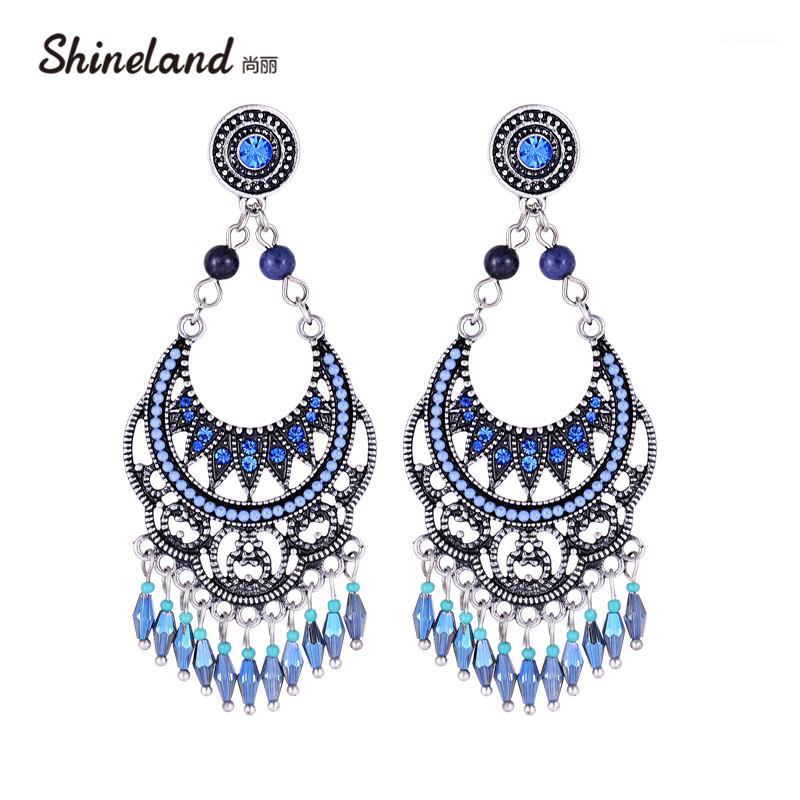 Shineland Bohemian trendy/bijoux Beads Earring Carved Tassel Fashion Ethnic Long Drop Earrings for Women1
Shineland Bohemian trendy/bijoux Beads Earring Carved Tassel Fashion Ethnic Long Drop Earrings for Women1
