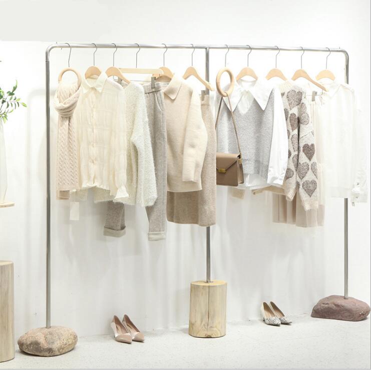 Customized stainless steel silver rack Commercial Furniture drawing stone floor hanging racks women's cloth shop display shelf