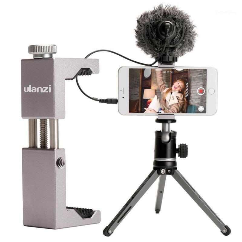Ulanzi ST-02S Universal Phone Tripod Mount Smartphone Clip with Microphone Holder Phone Video Accessories Supporting V+H Photo1
Ulanzi ST-02S Universal Phone Tripod Mount Smartphone Clip with Microphone Holder Phone Video Accessories Supporting V+H Photo1
