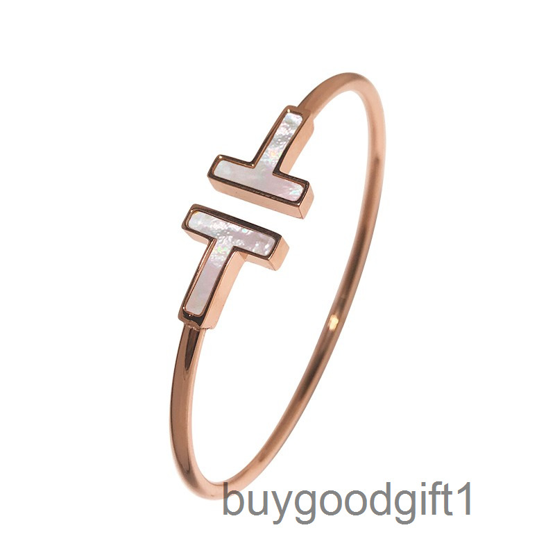 H Korean fashion white mother shell diamond inlaid double TT Bracelet opening T-shaped titanium steel plated 1
H Korean fashion white mother shell diamond inlaid double TT Bracelet opening T-shaped titanium steel plated 1