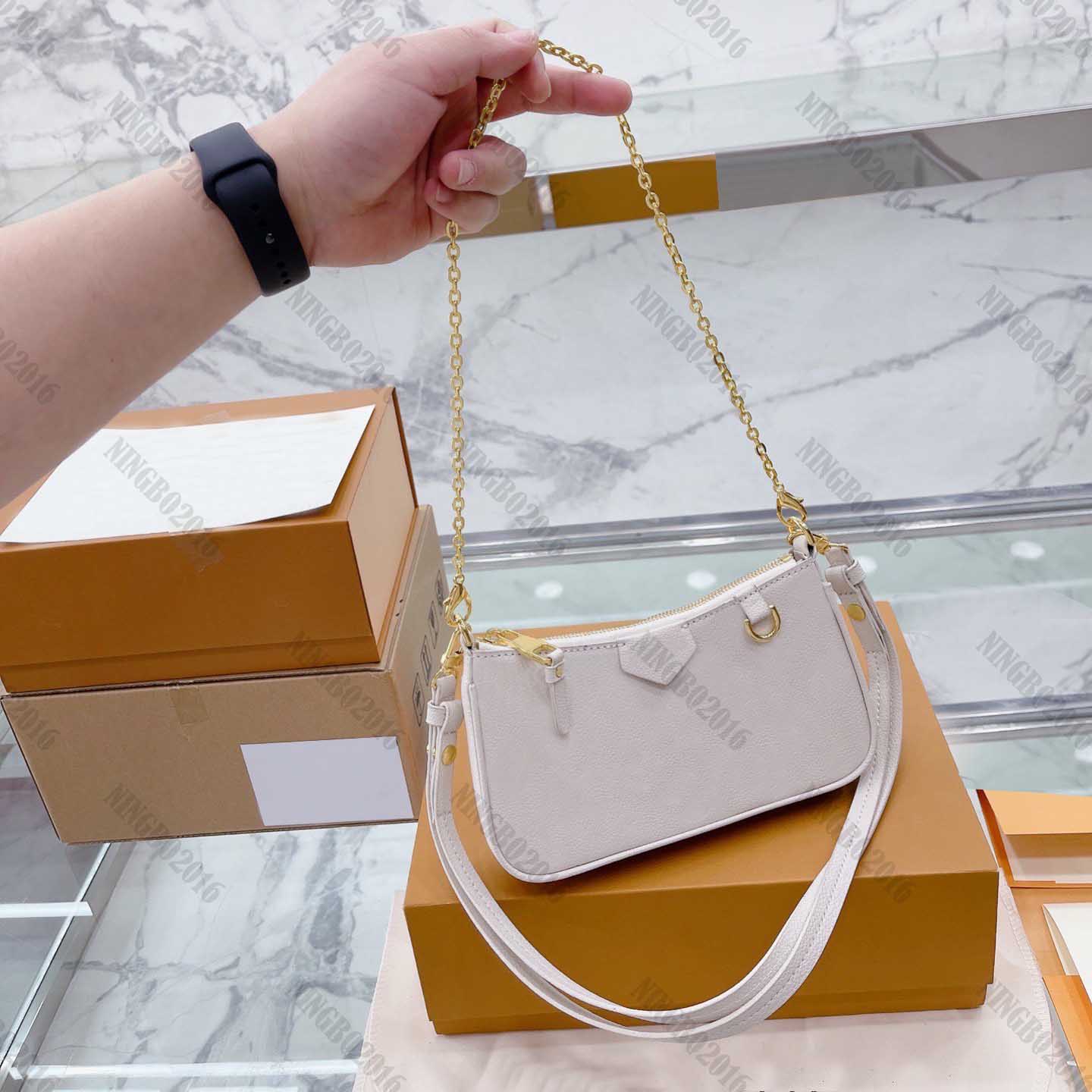 High Quality Embossed Leather Cross Body Bag Creme White Black Zipped Diagonal Handbag Wallets Chain Designers Womens Armpit Shoulder Bags Handbags Purses Totes
High Quality Embossed Leather Cross Body Bag Creme White Black Zipped Diagonal Handbag Wallets Chain Designers Womens Armpit Shoulder Bags Handbags Purses Totes