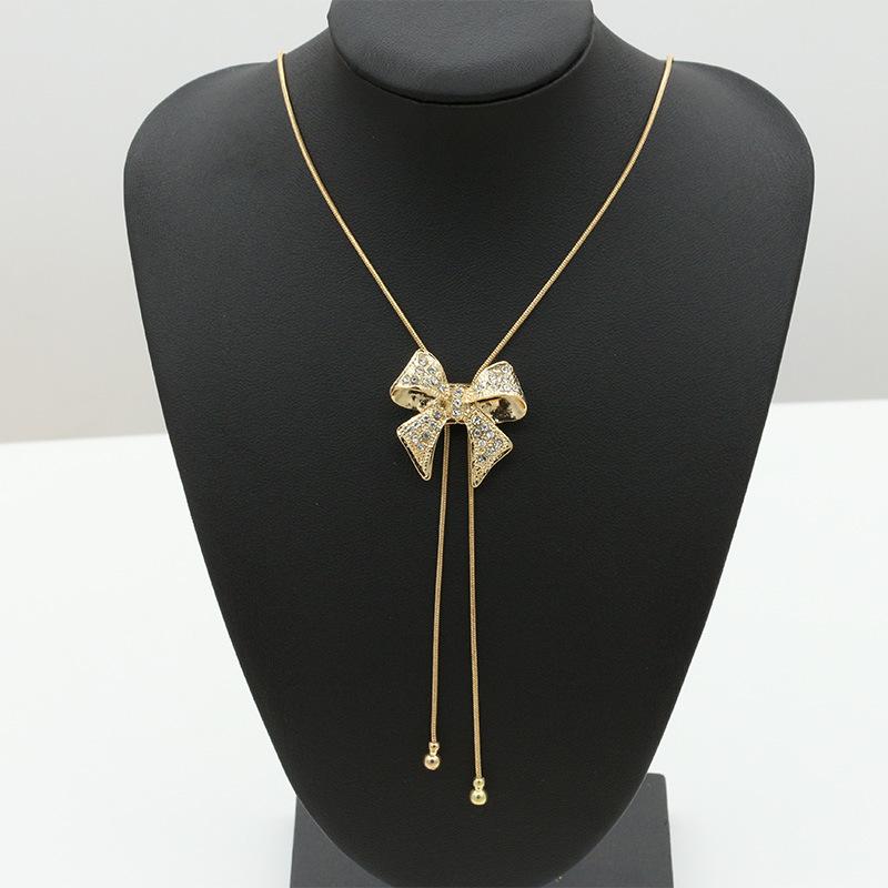 Korean version of the new popular style jewelry bow pendant crystal necklace wool chain girls wholesale hot-selling
Korean version of the new popular style jewelry bow pendant crystal necklace wool chain girls wholesale hot-selling