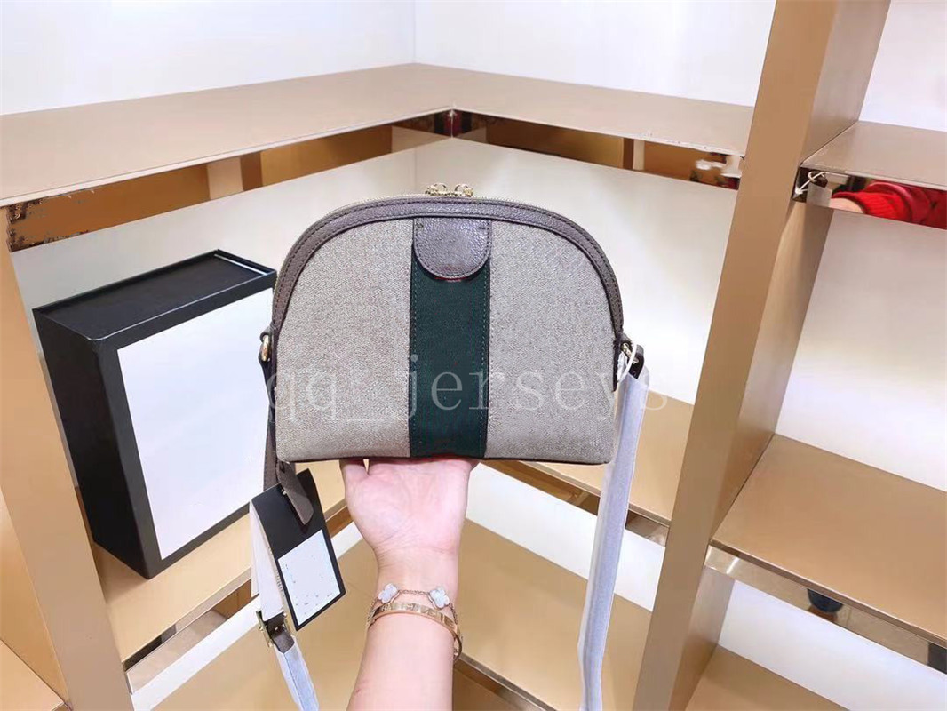 Shell bag Cross body Luxury Designer Brand Handbags High Quality Purse mini bag bags Print Women Wallet, No bags
Shell bag Cross body Luxury Designer Brand Handbags High Quality Purse mini bag bags Print Women Wallet, No bags