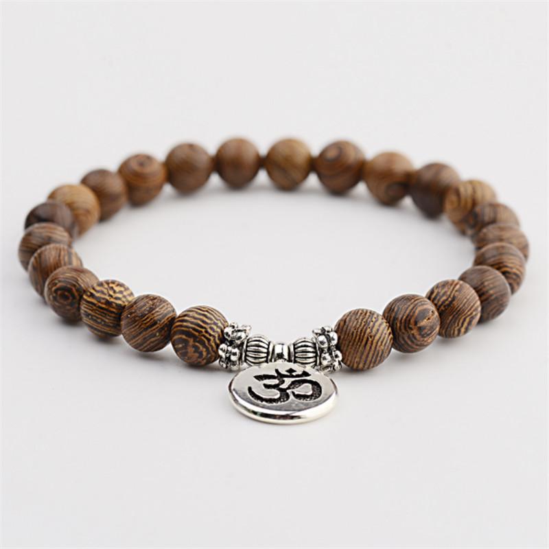 Natural Sandalwood OM Bracelets Men Jewelry Prayer pulsera hombre Buddha Wenge Prayer Wood Beads Lotus Rosary Bracelet For Women
Natural Sandalwood OM Bracelets Men Jewelry Prayer pulsera hombre Buddha Wenge Prayer Wood Beads Lotus Rosary Bracelet For Women