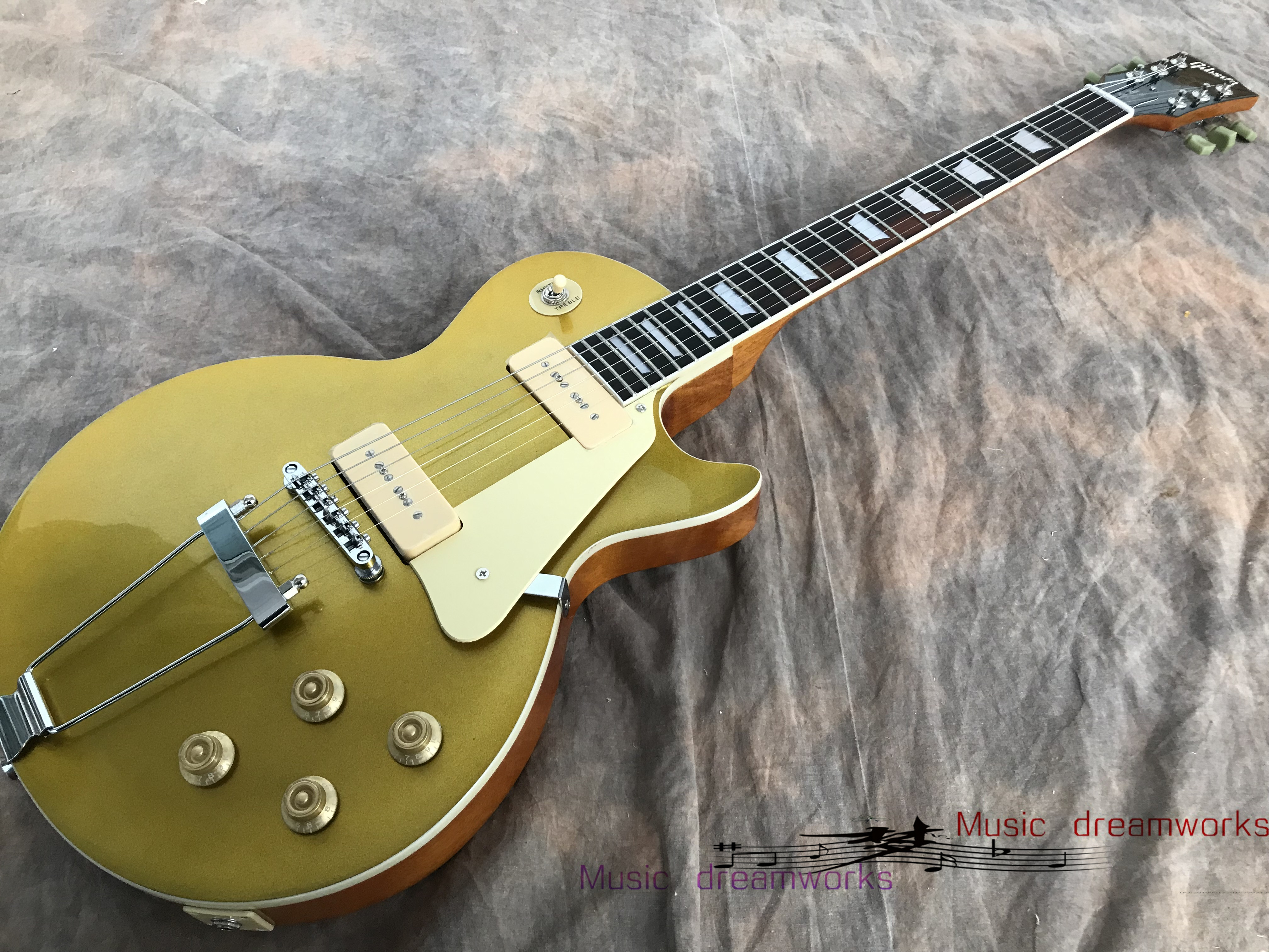 China electric guitar OEM shop L P Standard Electric Guitar Top of the gold, P90 style pickup 
China electric guitar OEM shop L P Standard Electric Guitar Top of the gold, P90 style pickup