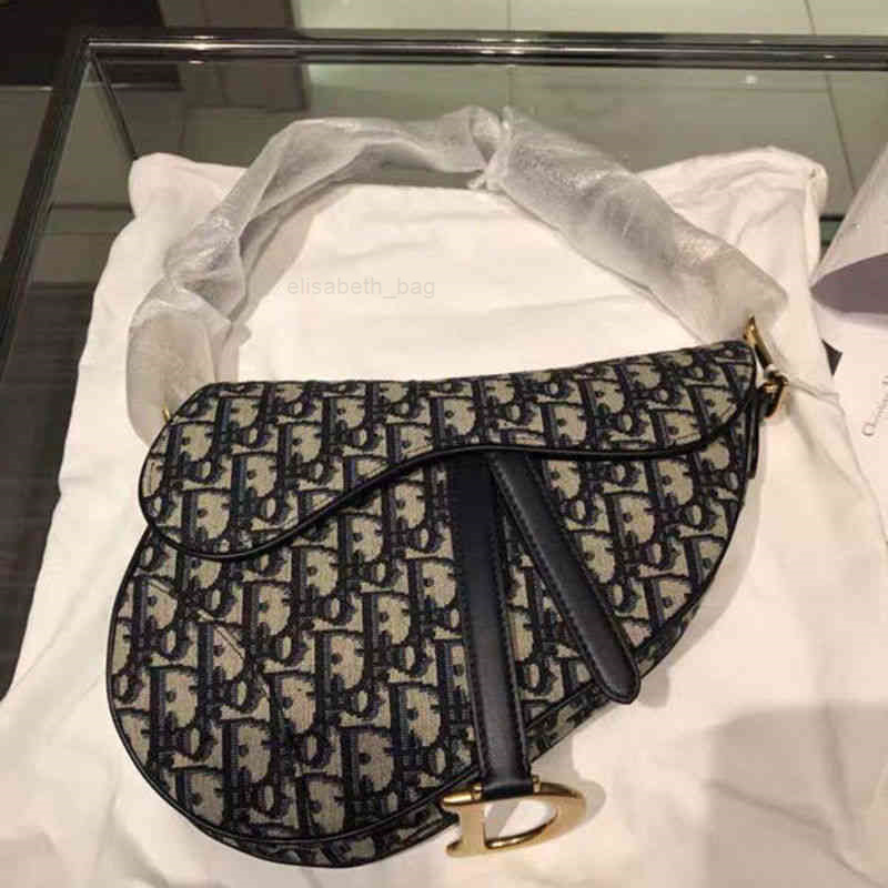 Classic Luxury Dio Handbags Designer Luxury Women Handbags Christians Bag 2022 Women's D-shaped Saddle Retro One Shoulder Cross Net Red Canv
Classic Luxury Dio Handbags Designer Luxury Women Handbags Christians Bag 2022 Women's D-shaped Saddle Retro One Shoulder Cross Net Red Canv