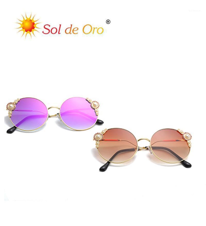 SOL DE ORO Female Pearl Diamond Sunglasses Trend Fashion Metal Round Frame Sunglasses Personality Wave Temple Eyewear1
SOL DE ORO Female Pearl Diamond Sunglasses Trend Fashion Metal Round Frame Sunglasses Personality Wave Temple Eyewear1