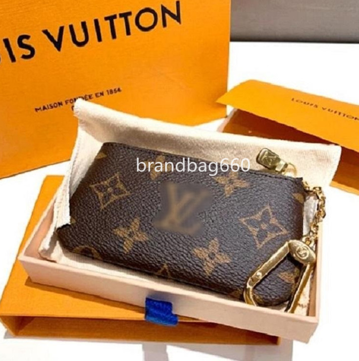 KEY POUCH POCHETTE CLES Designers Mini Wallet Fashion Womens Mens Key Ring Credit Card Holder Coin Purse Luxury Bags, Brown flowers
KEY POUCH POCHETTE CLES Designers Mini Wallet Fashion Womens Mens Key Ring Credit Card Holder Coin Purse Luxury Bags, Brown flowers