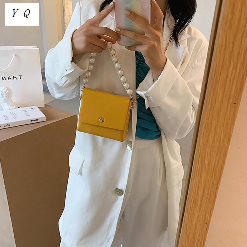 Mini solid color soft PU Leather pearl Chain Crossbody shoulder Bags Women 2021 new fashion High quality designer handbags, Black
Mini solid color soft PU Leather pearl Chain Crossbody shoulder Bags Women 2021 new fashion High quality designer handbags, Black