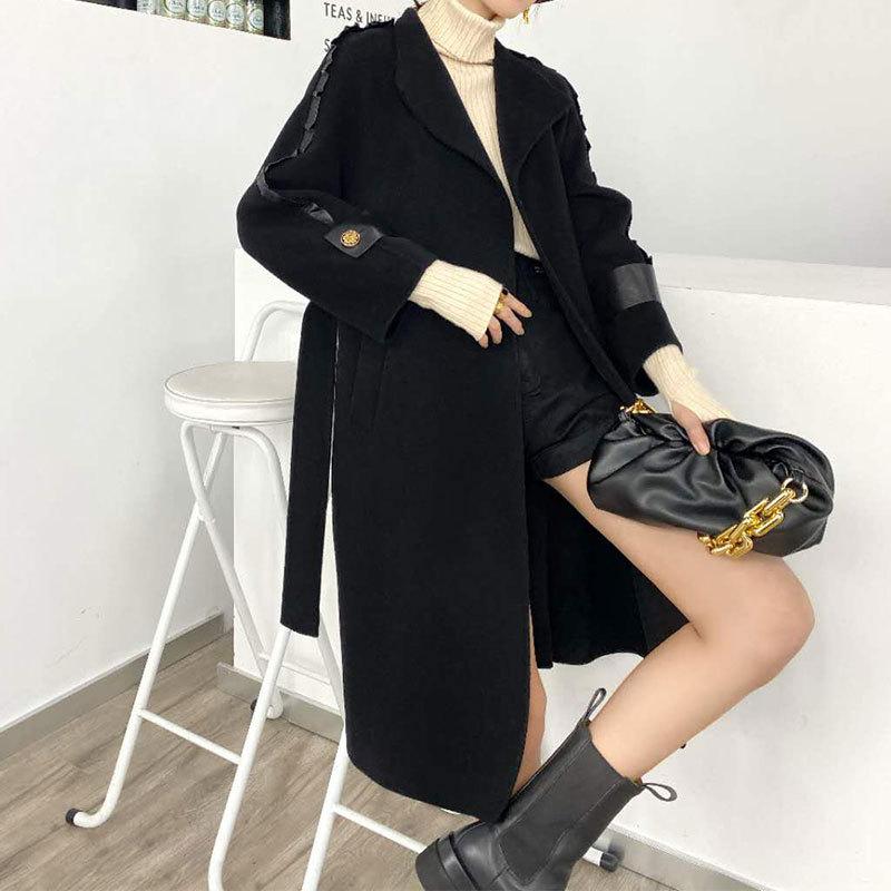 Han edition of wool coat long pure color suit collar leather stitching black waist including cashmere cloth coat female
Han edition of wool coat long pure color suit collar leather stitching black waist including cashmere cloth coat female