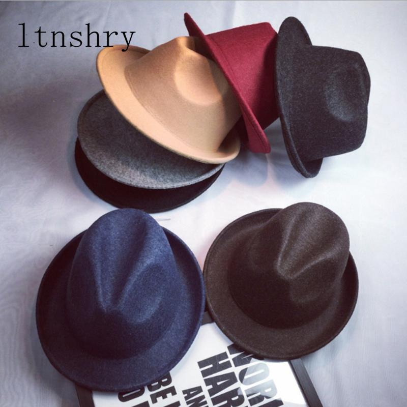 2020 Wide Brim pin Black Flat Brim Felt Jazz Hat Autumn Winter Bowler Hats for Women Men prom Party cap Solid color Gorra
2020 Wide Brim pin Black Flat Brim Felt Jazz Hat Autumn Winter Bowler Hats for Women Men prom Party cap Solid color Gorra