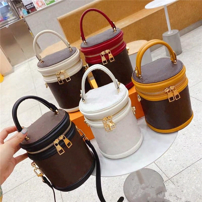 6 color CANNES matching round bucket bag fashion cosmetic bag classic flower letter design element handbag Louise Vutton Handbags
6 color CANNES matching round bucket bag fashion cosmetic bag classic flower letter design element handbag Louise Vutton Handbags
