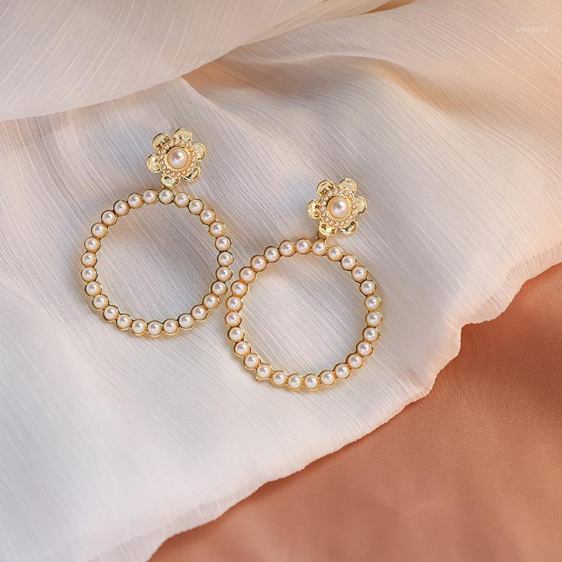 Stud Jinwateryu The Same Circle Flower Earrings Female Pearl Round Personality Temperament Wild Earrings1
Stud Jinwateryu The Same Circle Flower Earrings Female Pearl Round Personality Temperament Wild Earrings1