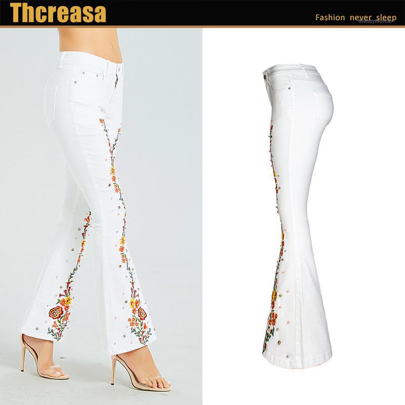 New wish hot women s wear embroidery casual wide leg pants pure white flare jeans women1
New wish hot women s wear embroidery casual wide leg pants pure white flare jeans women1