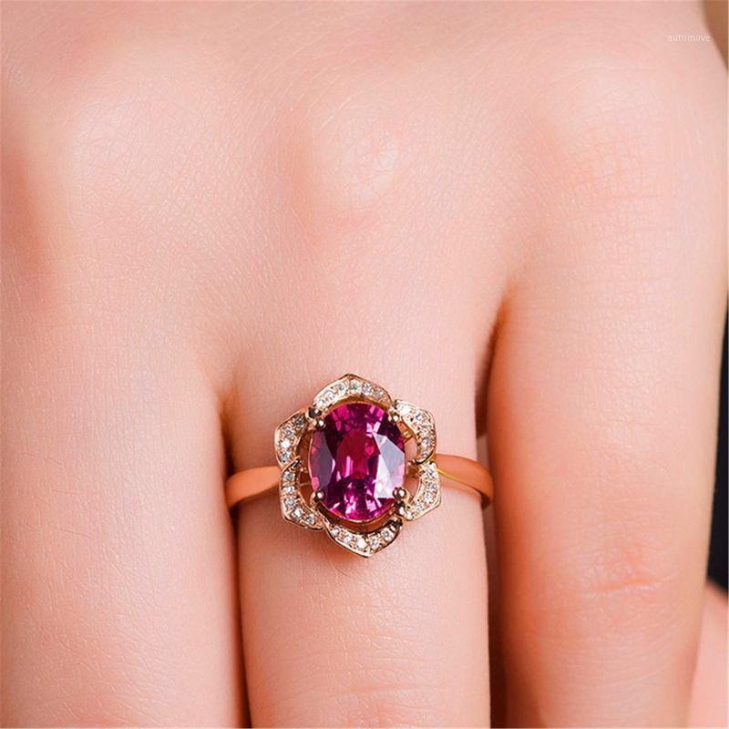 Charm Female Oval Flower Red Stone Ring Unique Style Rose Gold Color Finger Ring Vintage Bride Party Wedding Rings For Women1
Charm Female Oval Flower Red Stone Ring Unique Style Rose Gold Color Finger Ring Vintage Bride Party Wedding Rings For Women1