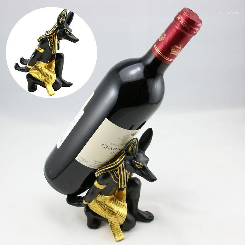 Ancient Egyptian Anubis Wine Rack Living Room Figurines Resin Craft Fashion Wine Seat Egypt Bottle Holder Ornament1
Ancient Egyptian Anubis Wine Rack Living Room Figurines Resin Craft Fashion Wine Seat Egypt Bottle Holder Ornament1