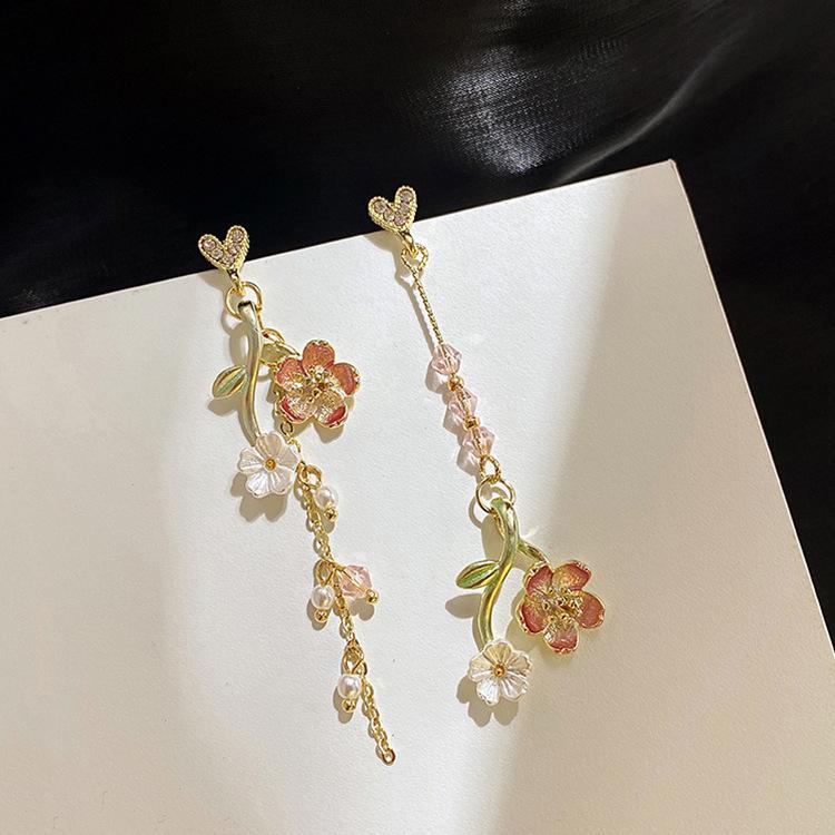 Temperament flower earrings earrings Korean style tassel pendant long personality cold and versatile female
Temperament flower earrings earrings Korean style tassel pendant long personality cold and versatile female