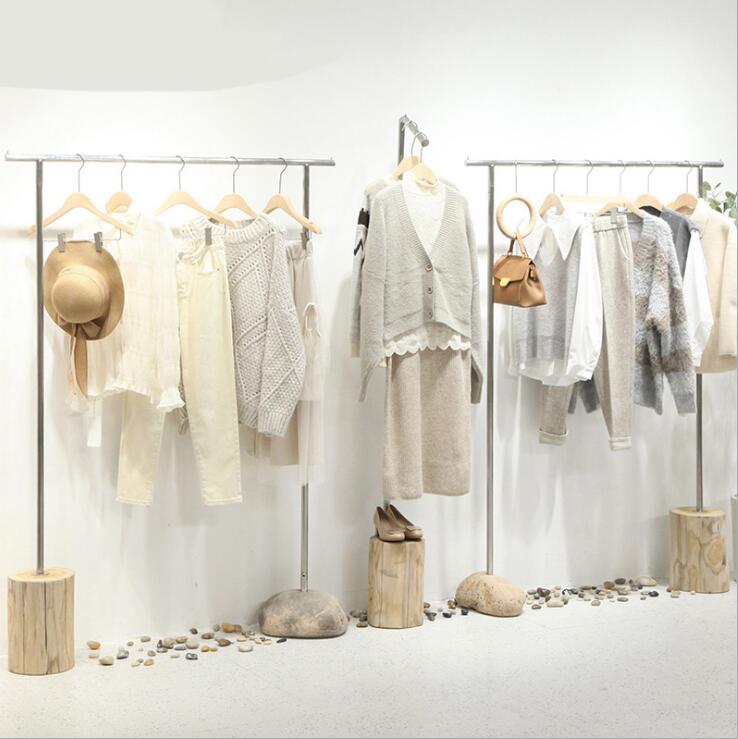 Customized stainless steel silver rack Commercial Furniture drawing stone floor hanging racks women's cloth shop display shelf