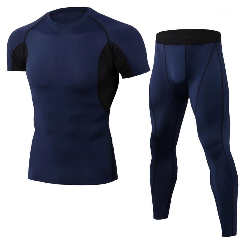Men' Tightfitting Fitness Training Clothes Stretch Quick-drying Set Short-sleeved Tshirt + Trousers Two-piece Suit Sportswear1
Men' Tightfitting Fitness Training Clothes Stretch Quick-drying Set Short-sleeved Tshirt + Trousers Two-piece Suit Sportswear1