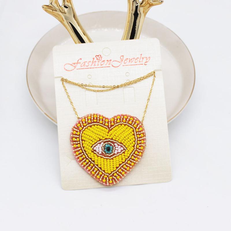 New Bohemian Rhinestone Rice Beads Heart Eye Necklace Stylish temperament exaggerated heart-shaped necklace 527
New Bohemian Rhinestone Rice Beads Heart Eye Necklace Stylish temperament exaggerated heart-shaped necklace 527