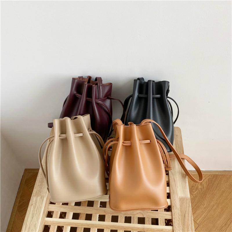 2021 women's bag large capacity fashion simple bucket bag Pu drawstring soft surface slanting single shoulder, Black
2021 women's bag large capacity fashion simple bucket bag Pu drawstring soft surface slanting single shoulder, Black