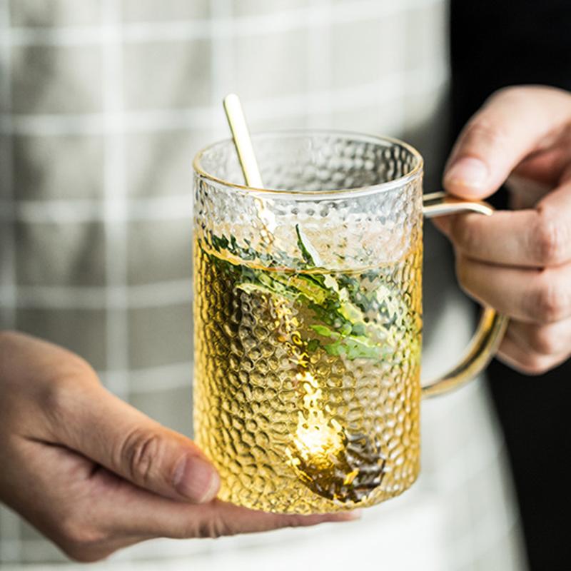 MUZITY Glass Mug Embossed Design Glass Milk or Juice Mug with Golden Handle 350ML Drinkware, 1 mug
MUZITY Glass Mug Embossed Design Glass Milk or Juice Mug with Golden Handle 350ML Drinkware, 1 mug