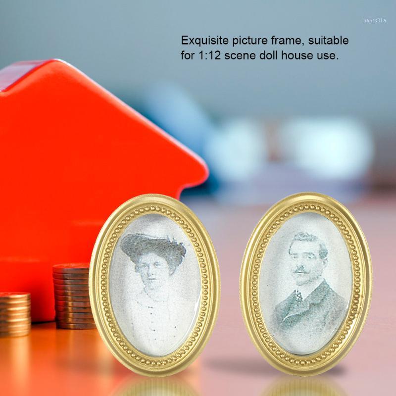 2Pcs/Set Creative doll house Miniature Oval Frame Picture Photo Dollhouse Mini Photo Frame Image DIY Accessories1
2Pcs/Set Creative doll house Miniature Oval Frame Picture Photo Dollhouse Mini Photo Frame Image DIY Accessories1